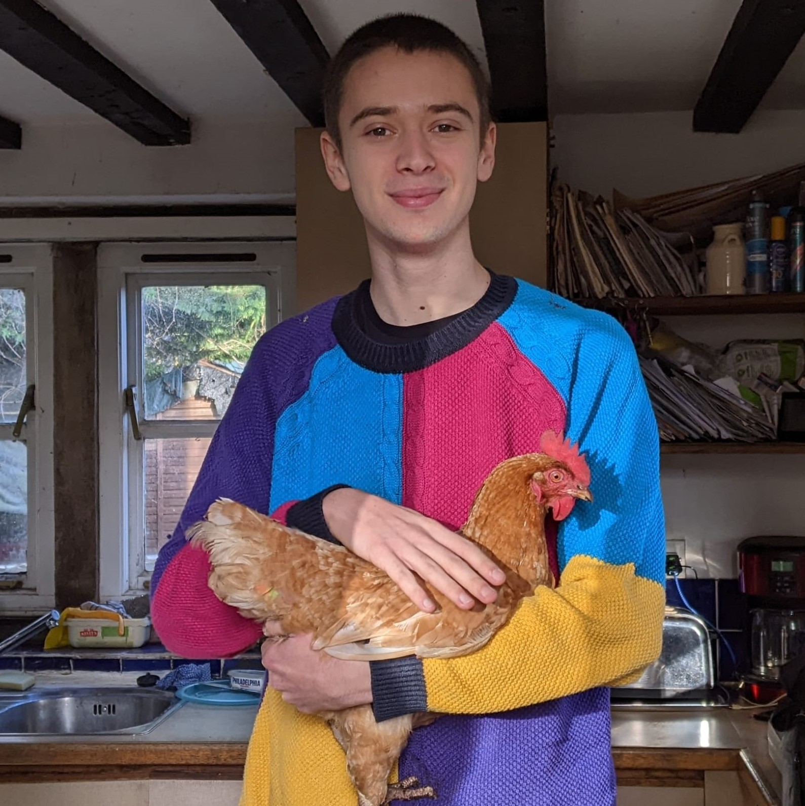 A photo of me holding a chicken!